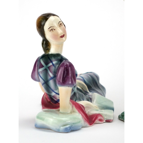 562 - Four Art Deco hand painted pottery figurines, the largest of a Spanish dancer, each with impressed m... 