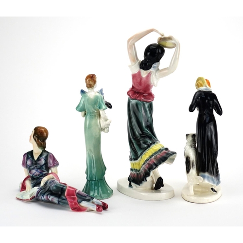 562 - Four Art Deco hand painted pottery figurines, the largest of a Spanish dancer, each with impressed m... 