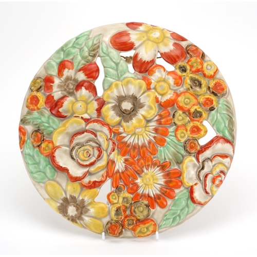 527 - Clarice Cliff floral wall plaque, factory marks to the reverse, 33cm in diameter
