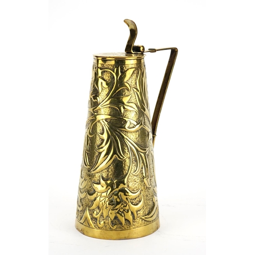 573 - Arts & Crafts brass jug by Keswick, the tapering body embossed with stylised flowers and foliage, im... 