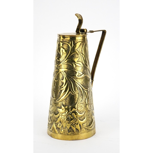 573 - Arts & Crafts brass jug by Keswick, the tapering body embossed with stylised flowers and foliage, im... 