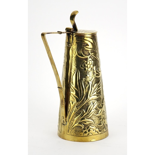 573 - Arts & Crafts brass jug by Keswick, the tapering body embossed with stylised flowers and foliage, im... 