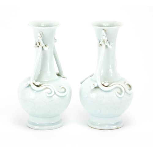 335 - Pair of Chinese celadon glazed vases, each with twin water dragon handles, the bodies incised with f... 