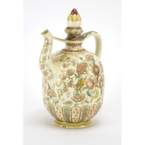 559 - Hungarian pottery wine ewer by Zsolnay Pecs, hand painted with flowers and foliage, factory marks to... 