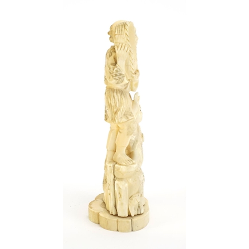 410 - Japanese carved ivory okimono of a fisherman and young boy, 18cm high