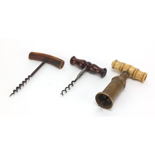 32 - Three 19th century corkscrews including an example with bone handle and brass barrel