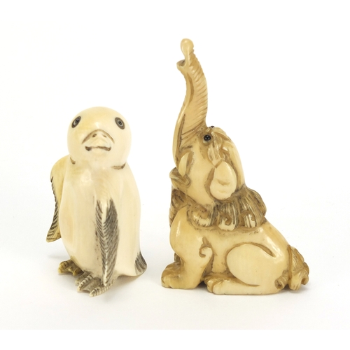 441 - ** WITHDRAWN FROM SALE ** Two Japanese carved ivory netsuke's one of a penguin and an elephant, both... 