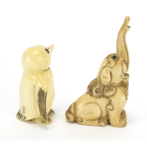 441 - ** WITHDRAWN FROM SALE ** Two Japanese carved ivory netsuke's one of a penguin and an elephant, both... 