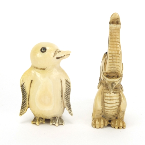 441 - ** WITHDRAWN FROM SALE ** Two Japanese carved ivory netsuke's one of a penguin and an elephant, both... 