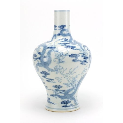 312 - Chinese blue and white porcelain vase hand painted with dragons chasing the flaming pearl amongst cl... 