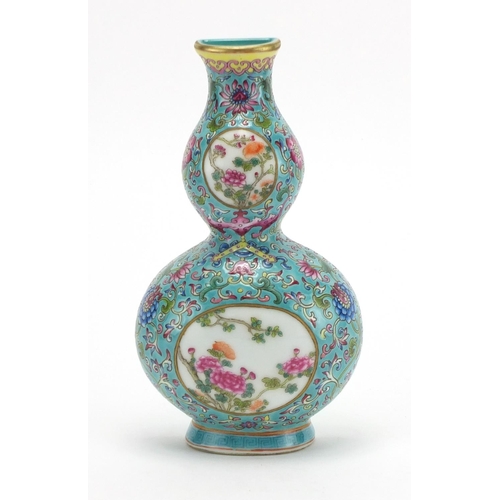 305 - Chinese porcelain double gourd vase wall pocket, finely hand painted in the famille rose with a bat ... 