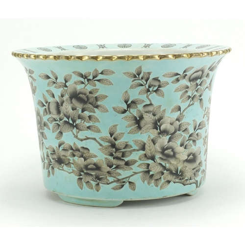 311 - Chinese porcelain turquoise ground three footed planter hand panted with flowers, four figure iron r... 