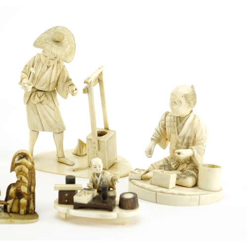 406 - Japanese carved ivory okimono's including a man holding a fan and a fisherman, some with character m... 