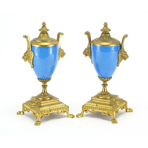 489 - Pair of 19th century Sevres style vase garnitures with twin lions head handles, each hand painted wi... 