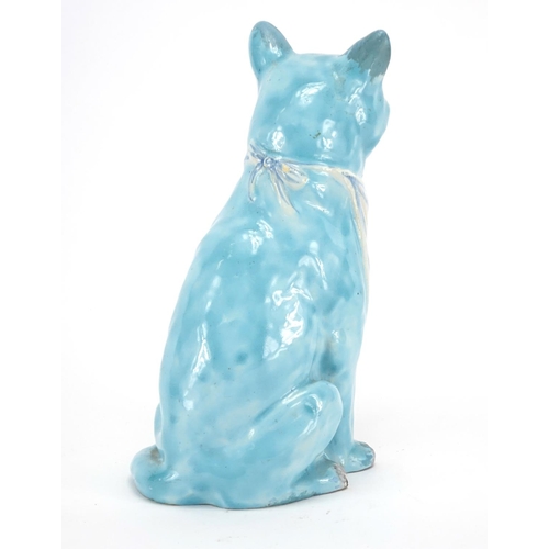 555 - Mosanic faience pottery model of a seated cat with beaded eyes, 24cm high
