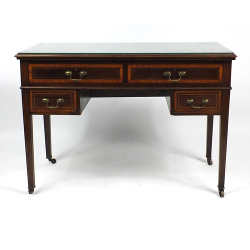 9 - Edwardian inlaid mahogany writing desk, fitted with four drawers raised on tapering legs, 75cm H x 1... 