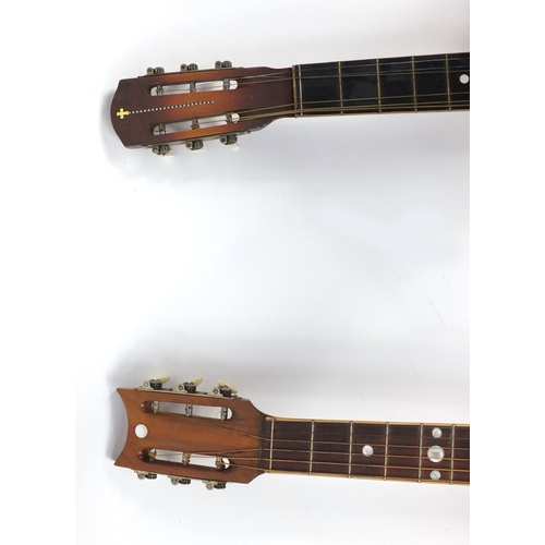 146 - Two vintage inlaid six string acoustic guitars, the largest 99cm high