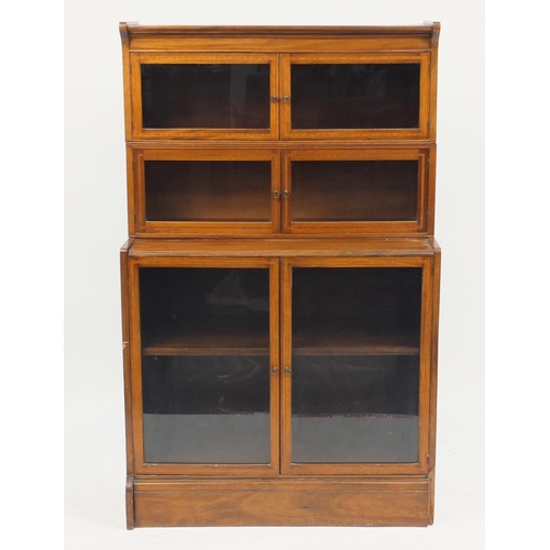 2013 - Inlaid mahogany three section stacking bookcase with glazed doors, 142cm H x 88cm W x 38cm D