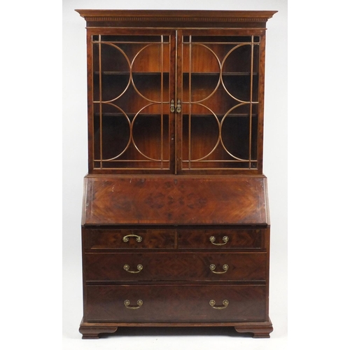 2018 - Georgian style mahogany bureau bookcase by Warings, fitted with a pair of glazed doors above a fall ... 