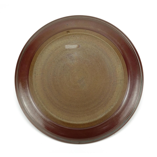 551 - Studio pottery charger by David Lloyd Jones, impressed marks to the underside, 47cm in diameter
