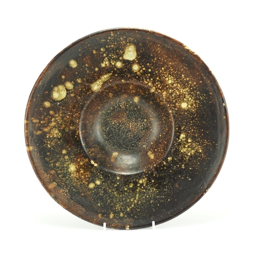 550 - Poole Carter Stabler Adams pottery shallow bowl, having an all over brown glaze, impressed factory m... 