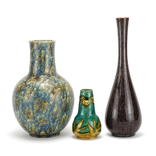 532 - Three art pottery vases comprising a Minton's Secessionist vase No.42 and two Bretby examples, numbe... 