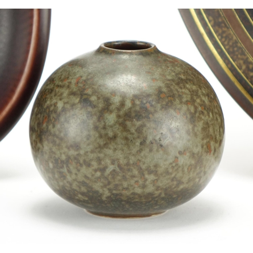 566 - Swedish and Danish art pottery including a Rorstrand charger by Gunnar Nylund, Saxbo vase numbered 1... 