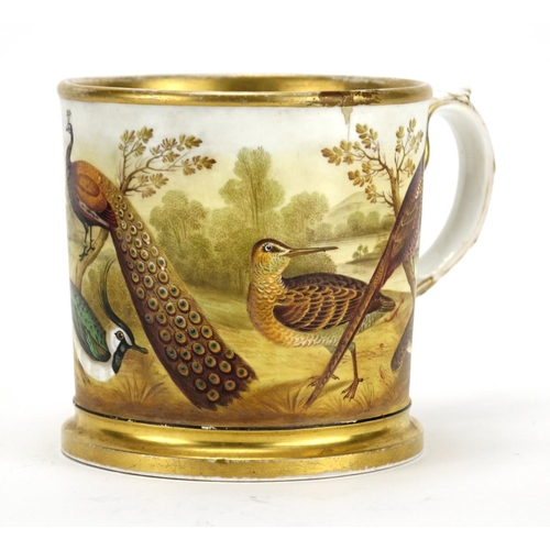 500 - 19th century porcelain tankard finely hand painted with wild birds before a landscape, 13.5cm high