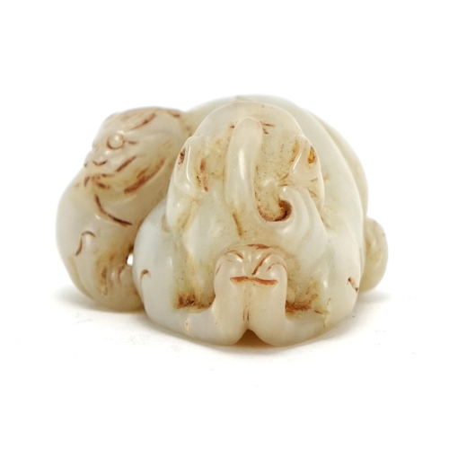 398 - Chinese celadon jade carving of two mythical creatures, 6.2cm wide