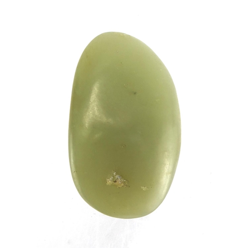 395 - Chinese celadon green jade touch stone, 6cm wide