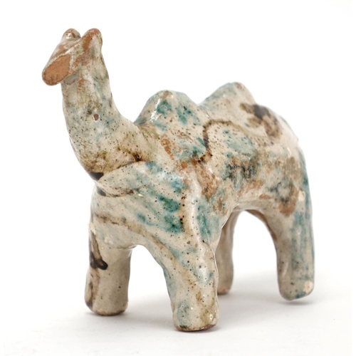 453 - Turkish green and brown glazed pottery camel, 11.5cm high