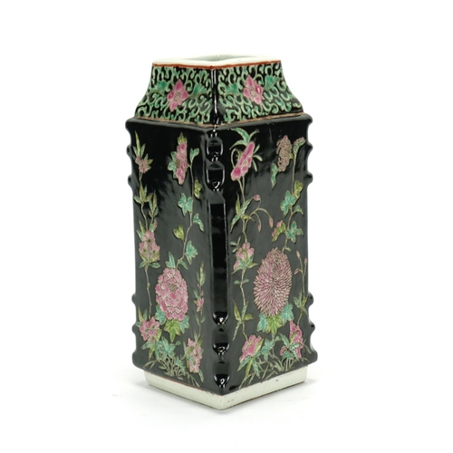 306 - Chinese porcelain diamond shaped vase, hand painted in the famille noire palette with flowers, six f... 