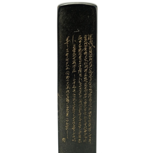 405 - Chinese black soapstone desk seal carved with calligraphy, 14cm high