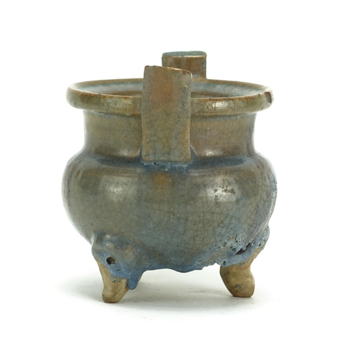 344 - Chinese pottery tripod censer with twin handles, having a turquoise and purple glaze, 12.5cm high