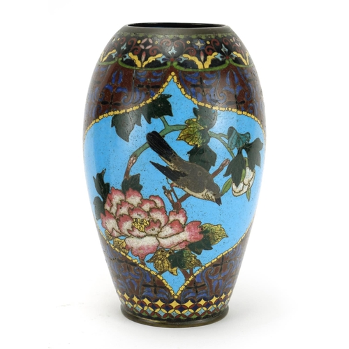 374 - Pair of Japanese cloisonné vases raised on hardwood stands, each enamelled with birds of paradise an... 