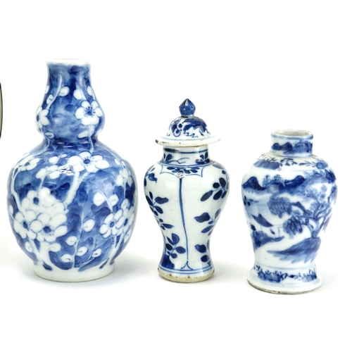 323 - Chinese blue and white porcelain including a double gourd prunus vase and plate hand painted with fl... 