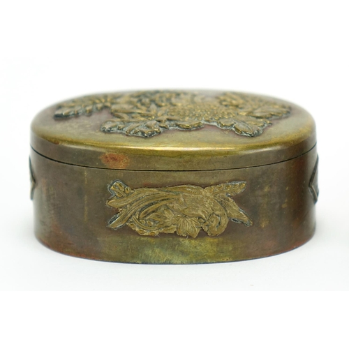 383 - Japanese bronze and brass metalware including four trinket boxes, decorated with birds of paradise a... 