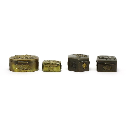 383 - Japanese bronze and brass metalware including four trinket boxes, decorated with birds of paradise a... 