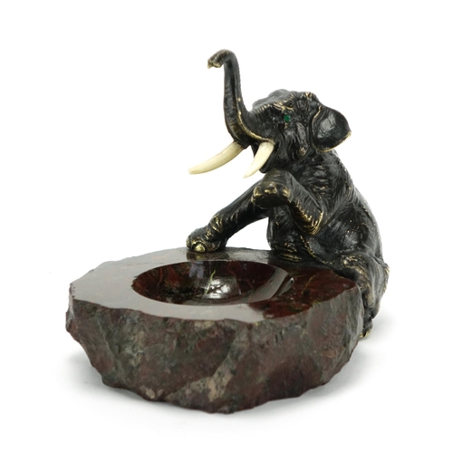 11 - Japanese patinated bronze elephant and serpentine marble pin dish, 15.5cm high