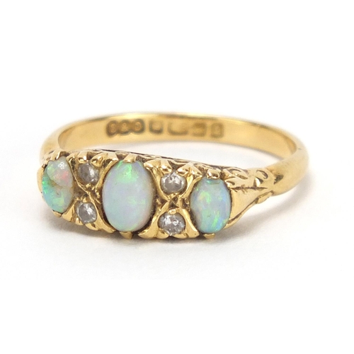 710 - 18ct gold opal and diamond ring, Birmingham 1965, size N, approximate weight 4.1g