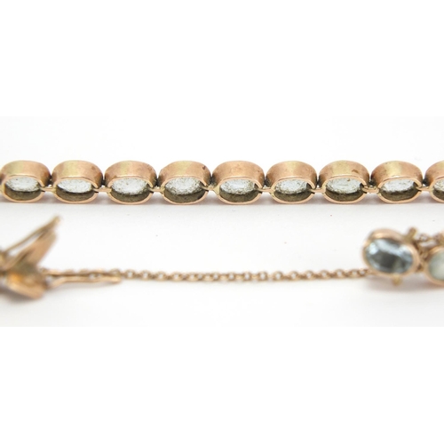 713 - 9ct gold blue stone bracelet, 18cm in length, approximate weight 13.5g
