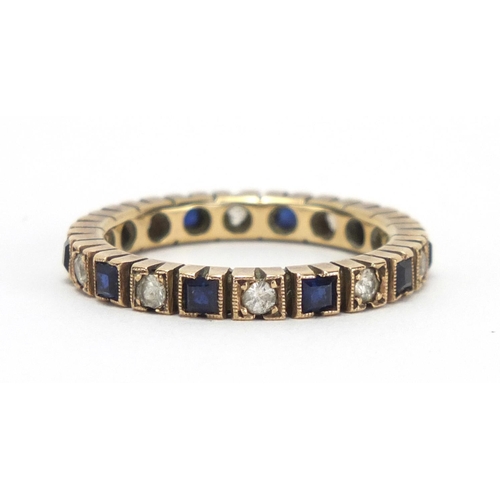 777 - Unmarked gold sapphire and spinel eternity ring, size Q, approximate weight 3.6g