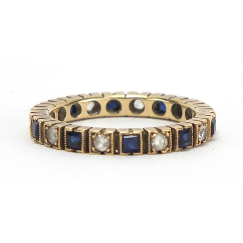 777 - Unmarked gold sapphire and spinel eternity ring, size Q, approximate weight 3.6g