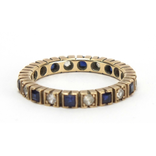 777 - Unmarked gold sapphire and spinel eternity ring, size Q, approximate weight 3.6g