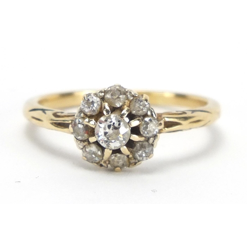 718 - Unmarked gold diamond nine stone cluster ring, size O, approximate weight 2.6g