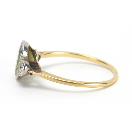 725 - Unmarked gold peridot and diamond ring, size R, approximate weight 2.4g