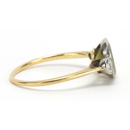 725 - Unmarked gold peridot and diamond ring, size R, approximate weight 2.4g