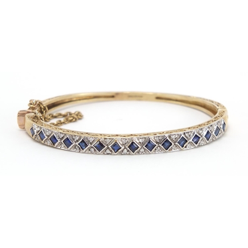 747 - 9ct gold sapphire and diamond bangle, G & T J makers mark, 6.5cm wide, approximate weight 16.1g