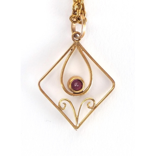 748 - Art Nouveau 9ct gold pink stone pendant, on a 9ct gold necklace, the pendant 2.8cm in length, approx... 