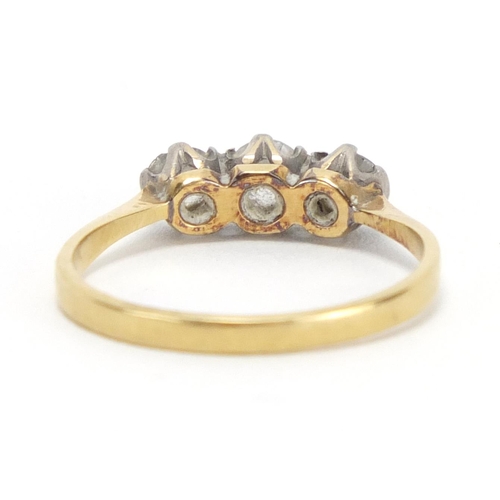 729 - 18ct gold diamond three stone ring, size M, approximate weight 2.0g